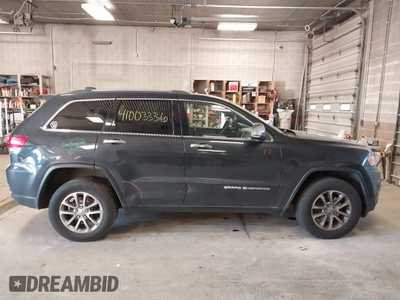 2015 Jeep Grand Cherokee Limited with VIN 1C4RJFBG5FC941811, listed as a IAAI auction lot 41003336 with 137,867 mi miles. Bid and sale history available at carsss.com. Image 13.