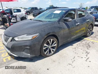 2019 Nissan Maxima Platinum z VIN 1N4AA6AV8KC366407, wystawiony jako IAAI lot #42329455 z przebiegiem 34 518 mil mil oraz . Historia ofert i sprzedaży dostępna na DreamBid. Obrazek 2.