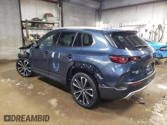2024 Mazda CX-50 Premium z VIN 7MMVABDY0RN174004, wystawiony jako Copart lot #44727115 z przebiegiem 4 796 mil mil oraz Szkoda całkowita • Salvage title. Historia ofert i sprzedaży dostępna na DreamBid. Obrazek 2.