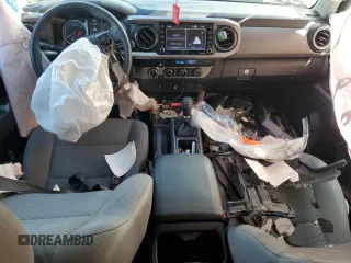 2021 Toyota Tacoma SR5 with VIN 3TMDZ5BN0MM103256, listed as a Copart auction lot 50101675 with 49,673 mi miles and Salvage title. Bid and sale history available at DreamBid. Image 8.