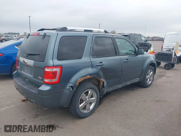 2012 Ford Escape Limited with VIN 1FMCU9EG4CKB90269, listed as a IAAI auction lot 42113793 with 171,514 mi miles. Bid and sale history available at carsss.com. Image 4.