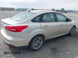 2018 Ford Focus SE with VIN 1FADP3FE7JL230870, listed as a IAAI auction lot 42021541 with 84,000 mi miles. Bid and sale history available at carsss.com. Image 4.