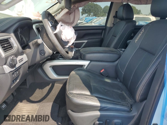2018 Nissan Titan Platinum Reserve with VIN 1N6BA1F49JN521225, listed as a Copart auction lot 69831004 with 92,536 mi miles and Salvage title. Bid and sale history available at DreamBid. Image 7.