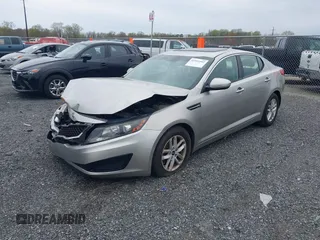 2011 Kia Optima LX with VIN KNAGM4A74B5097616, listed as a IAAI auction lot 41997992 with 157,417 mi miles and . Bid and sale history available at DreamBid. Image 2.