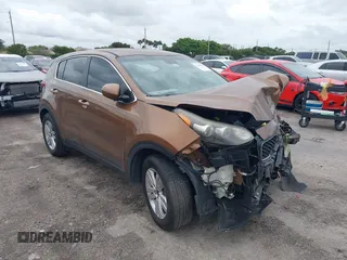 2018 Kia Sportage LX with VIN KNDPM3AC9J7481047, listed as a IAAI auction lot 41636184 with 160,385 mi miles. Bid and sale history available at carsss.com. Image 1.
