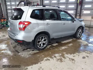 2015 Subaru Forester 2.5i Touring with VIN JF2SJAUCXFH471892, listed as a IAAI auction lot 41314722 with 94,717 mi miles. Bid and sale history available at carsss.com. Image 4.