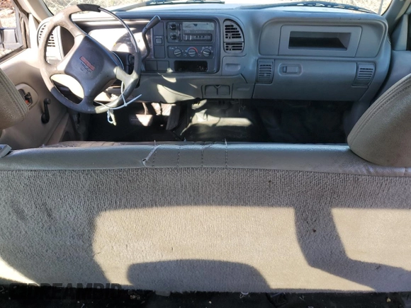 1999 GMC Sierra 1500 with VIN 1GTGC33RXXF096504, listed as a Copart auction lot 80027354 with 124,430 mi miles and Clean Title. Bid and sale history available at DreamBid. Image 8.