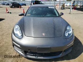 2014 Porsche Panamera S E-Hybrid z VIN WP0AD2A78EL044818, wystawiony jako Copart lot #65864484 z przebiegiem 141 423 mil mil oraz Szkoda całkowita • Salvage title. Historia ofert i sprzedaży dostępna na DreamBid. Obrazek 5.