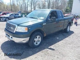 2006 Ford F-150 STX with VIN 1FTRX14WX6FB34558, listed as a IAAI auction lot 42146556 with 205,932 mi miles. Bid and sale history available at carsss.com. Image 2.