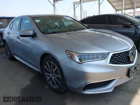 2018 Acura TLX Technology z VIN 19UUB2F55JA003175, wystawiony jako IAAI lot #42448852 z przebiegiem 54 875 mil mil oraz . Historia ofert i sprzedaży dostępna na DreamBid. Obrazek 1.