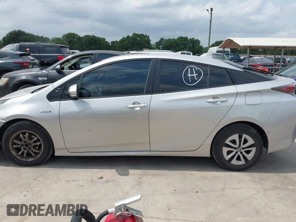 2016 Toyota Prius Four z VIN JTDKARFU5G3008768, wystawiony jako IAAI lot #42125504 z przebiegiem 164 229 mil mil oraz . Historia ofert i sprzedaży dostępna na DreamBid. Obrazek 14.