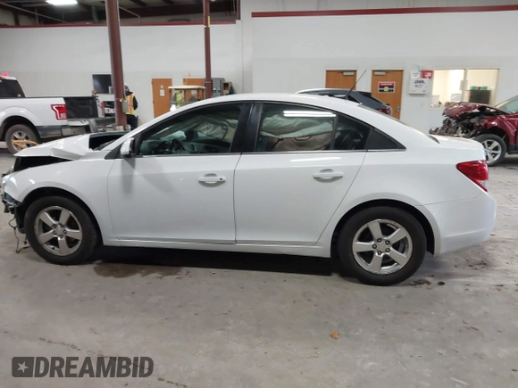 2014 Chevrolet Cruze 1LT with VIN 1G1PC5SB2E7182213, listed as a IAAI auction lot 40787686 with 129,882 mi miles and . Bid and sale history available at DreamBid. Image 14.