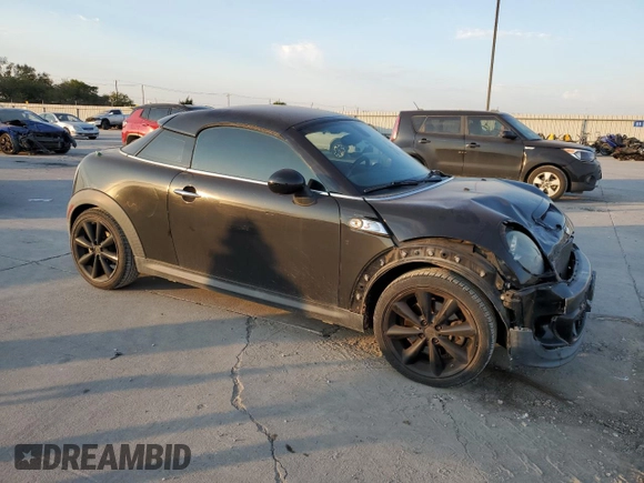 2013 MINI Coupe S z VIN WMWSX3C57DT408719, wystawiony jako Copart lot #75440574 z przebiegiem Nie podano mil oraz Szkoda całkowita • Salvage title. Historia ofert i sprzedaży dostępna na DreamBid. Obrazek 4.