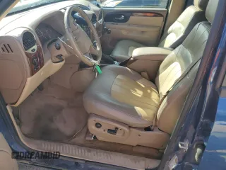 2004 GMC Envoy SLT with VIN 1GKDS13S042311327, listed as a Copart auction lot 42736995 with 235,164 mi miles and Salvage Title. Bid and sale history available at carsss.com. Image 7.