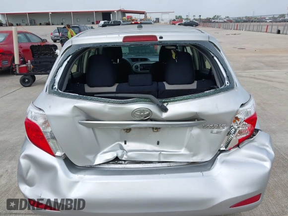 2013 Toyota Yaris L with VIN JTDKTUD32DD542761, listed as a IAAI auction lot 41969533 with 123,281 mi miles. Bid and sale history available at carsss.com. Image 6.