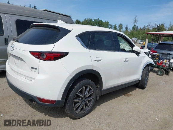 2018 Mazda CX-5 Grand Touring with VIN JM3KFBDM1J0309260, listed as a IAAI auction lot 42247237 with Not Provided miles and . Bid and sale history available at DreamBid. Image 4.