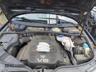 1999 Volkswagen Passat GL z VIN WVWMD63B2XE351611, wystawiony jako IAAI lot #42308007 z przebiegiem 180 893 mil mil oraz . Historia ofert i sprzedaży dostępna na DreamBid. Obrazek 10.