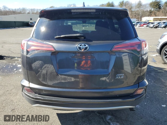 2018 Toyota RAV4 XLE with VIN 2T3RFREV7JW788173, listed as a Copart auction lot 45637205 with 106,475 mi miles and Salvage Title. Bid and sale history available at carsss.com. Image 6.