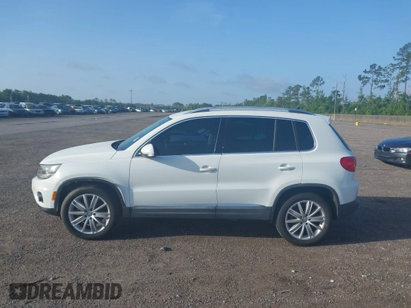 2014 Volkswagen Tiguan SE с VIN WVGAV3AX0EW598528, выставлен на аукционе IAAI как лот 42453851 с пробегом 141 869 миль миль и . История ставок и продаж доступна на DreamBid. Изображение 14.