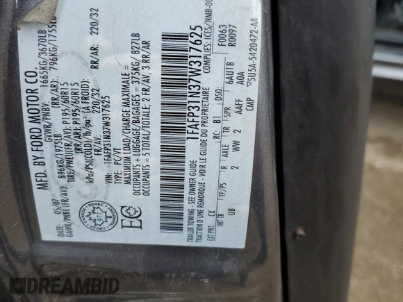 2007 Ford Focus S with VIN 1FAFP31N37W317625, listed as a Copart auction lot 61531315 with 230,530 mi miles and Clean title. Bid and sale history available at DreamBid. Image 12.