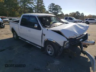 2002 Ford F-150 XLT with VIN 1FTRW07L42KB90527, listed as a Copart auction lot 85098244 with 143,213 mi miles and Salvage Title. Bid and sale history available at carsss.com. Image 4.