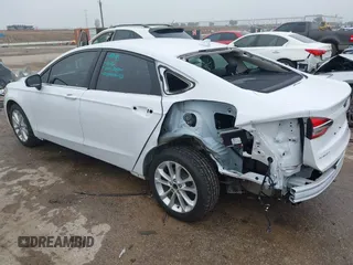 2020 Ford Fusion SE with VIN 3FA6P0LU2LR266943, listed as a IAAI auction lot 42160987 with 61,435 mi miles and . Bid and sale history available at DreamBid. Image 3.