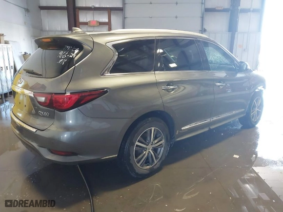 2019 Infiniti QX60 LUXE with VIN 5N1DL0MN0KC518816, listed as a IAAI auction lot 41614942 with 75,548 mi miles. Bid and sale history available at carsss.com. Image 4.