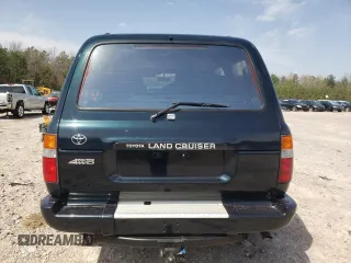 1995 Toyota Land Cruiser z VIN JT3DJ81W9S0112464, wystawiony jako Copart lot #49925395 z przebiegiem 215 698 mil mil oraz Czysty tytuł • Clean title. Historia ofert i sprzedaży dostępna na DreamBid. Obrazek 6.
