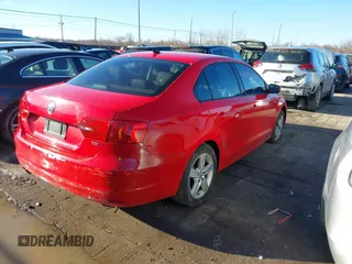 2012 Volkswagen Jetta TDI w/Premium z VIN 3VWLL7AJ3CM027986, wystawiony jako IAAI lot #41453897 z przebiegiem 68 928 mil mil oraz . Historia ofert i sprzedaży dostępna na DreamBid. Obrazek 4.