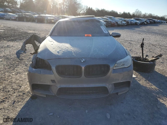 2014 BMW M5 with VIN WBSFV9C57ED593159, listed as a Copart auction lot 87475634 with 0 mi miles and Salvage Title. Bid and sale history available at carsss.com. Image 5.