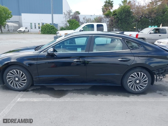 2023 Hyundai Sonata Hybrid Limited with VIN KMHL54JJ0PA061460, listed as a IAAI auction lot 42081519 with 54,624 mi miles. Bid and sale history available at carsss.com. Image 15.