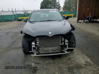 2021 BMW X1 xDrive28i z VIN WBXJG9C06M5T76049, wystawiony jako Copart lot #51816115 z przebiegiem 59 656 mil mil oraz Szkoda całkowita • Salvage title. Historia ofert i sprzedaży dostępna na DreamBid. Obrazek 12.