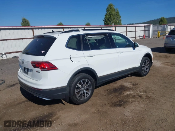 2020 Volkswagen Tiguan SE with VIN 3VV2B7AXXLM053170, listed as a IAAI auction lot 42203372 with 112,794 mi miles and . Bid and sale history available at DreamBid. Image 4.
