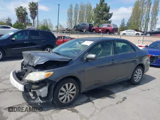 2013 Toyota Corolla L with VIN JTDBU4EE2DJ113876, listed as a IAAI auction lot 42044548 with 232,500 mi miles. Bid and sale history available at carsss.com. Image 2.