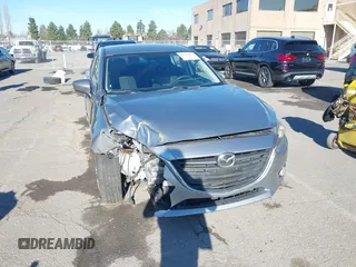 2015 Mazda 3 i SV with VIN JM1BM1T75F1258853, listed as a IAAI auction lot 41279651 with 36,437 mi miles. Bid and sale history available at carsss.com. Image 6.