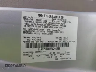 2008 Ford Focus S with VIN 1FAHP34N68W296159, listed as a IAAI auction lot 41913547 with 158,955 mi miles. Bid and sale history available at carsss.com. Image 9.