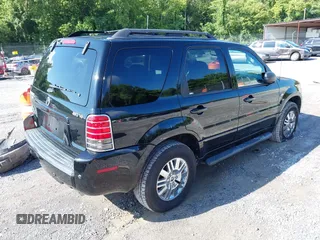 2005 Mercury Mariner Luxury z VIN 4M2CU57195DJ25375, wystawiony jako IAAI lot #42717392 z przebiegiem 65 400 mil mil oraz . Historia ofert i sprzedaży dostępna na DreamBid. Obrazek 4.