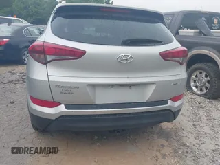 2017 Hyundai Tucson SE with VIN KM8J3CA44HU585714, listed as a IAAI auction lot 42097980 with 96,483 mi miles. Bid and sale history available at carsss.com. Image 6.
