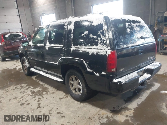 1999 Cadillac Escalade z VIN 1GYEK13R6XR404534, wystawiony jako IAAI lot #41391379 z przebiegiem 127 612 mil mil oraz . Historia ofert i sprzedaży dostępna na DreamBid. Obrazek 3.