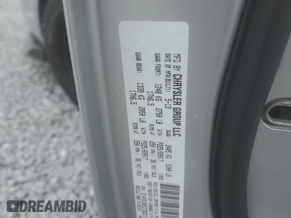 2013 Dodge Journey SE z VIN 3C4PDCAB5DT695315, wystawiony jako Copart lot #49158735 z przebiegiem 165 093 mil mil oraz Szkoda całkowita • Salvage title. Historia ofert i sprzedaży dostępna na DreamBid. Obrazek 13.