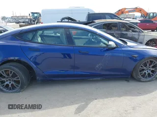 2021 Tesla Model S Long Range with VIN 5YJSA1E51MF442874, listed as a IAAI auction lot 39406495 with 36,127 mi miles and . Bid and sale history available at DreamBid. Image 14.