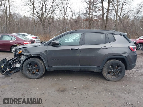 2020 Jeep Compass Latitude with VIN 3C4NJDBB5LT209864, listed as a IAAI auction lot 41793397 with 95,018 mi miles and . Bid and sale history available at DreamBid. Image 14.