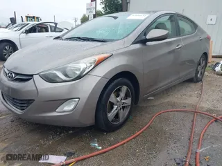 2012 Hyundai Elantra GLS with VIN 5NPDH4AE7CH086622, listed as a IAAI auction lot 42056652 with 302,842 mi miles. Bid and sale history available at carsss.com. Image 2.