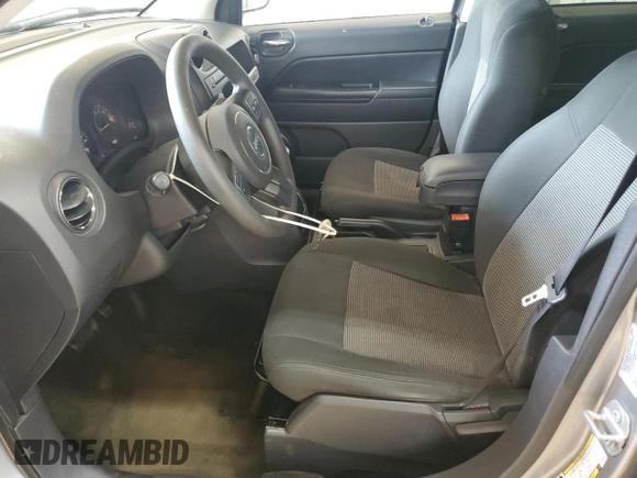 2016 Jeep Compass Sport z VIN 1C4NJCBA9GD810594, wystawiony jako Copart lot #56961885 z przebiegiem 151 386 mil mil oraz Szkoda całkowita • Salvage title. Historia ofert i sprzedaży dostępna na DreamBid. Obrazek 7.