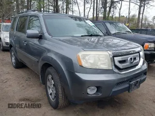 2009 Honda Pilot Touring z VIN 5FNYF488X9B044718, wystawiony jako IAAI lot #41962550 z przebiegiem 251 192 mil mil oraz . Historia ofert i sprzedaży dostępna na DreamBid. Obrazek 1.