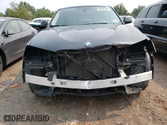 2015 BMW X4 xDrive28i with VIN 5UXXW3C55F0M87998, listed as a Copart auction lot 59693723 with 73,846 mi miles. Bid and sale history available at carsss.com. Image 5.