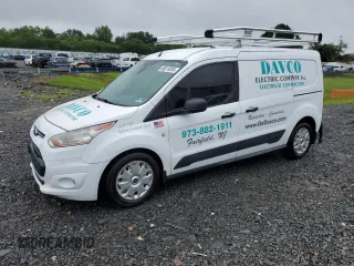 2014 Ford Transit Connect XLT with VIN NM0LE7F77E1148995, listed as a Copart auction lot 60619265 with 98,288 mi miles and Salvage title. Bid and sale history available at DreamBid. Image 1.