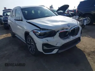 2022 BMW X1 sDrive28i with VIN WBXJG7C05N5U58988, listed as a IAAI auction lot 41466393 with 56,062 mi miles. Bid and sale history available at carsss.com. Image 1.