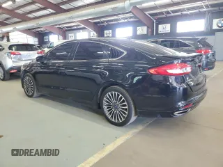 2017 Ford Fusion Titanium z VIN 3FA6P0K96HR124759, wystawiony jako Copart lot #61414395 z przebiegiem 175 655 mil mil oraz Czysty tytuł • Clean title. Historia ofert i sprzedaży dostępna na DreamBid. Obrazek 2.