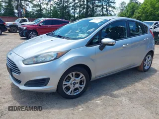 2016 Ford Fiesta SE with VIN 3FADP4EJ7GM121143, listed as a IAAI auction lot 42242739 with 142,351 mi miles and . Bid and sale history available at carsss.com. Image 2.